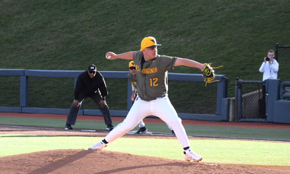 WVU Baseball right-handed pitcher Blaine Traxel throws during a game.