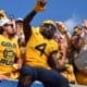 Leddie Brown with WVU Football fans