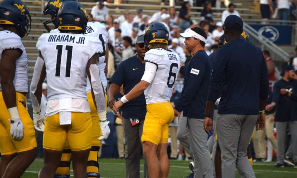 WVU Football HC Neal Brown, Garrett Greene and Chad Scott