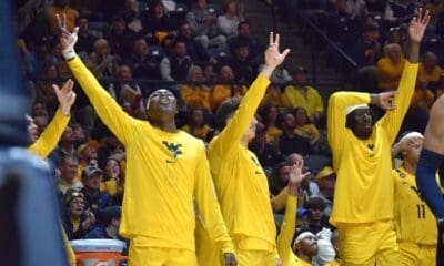 WVU Basketball team celebrating