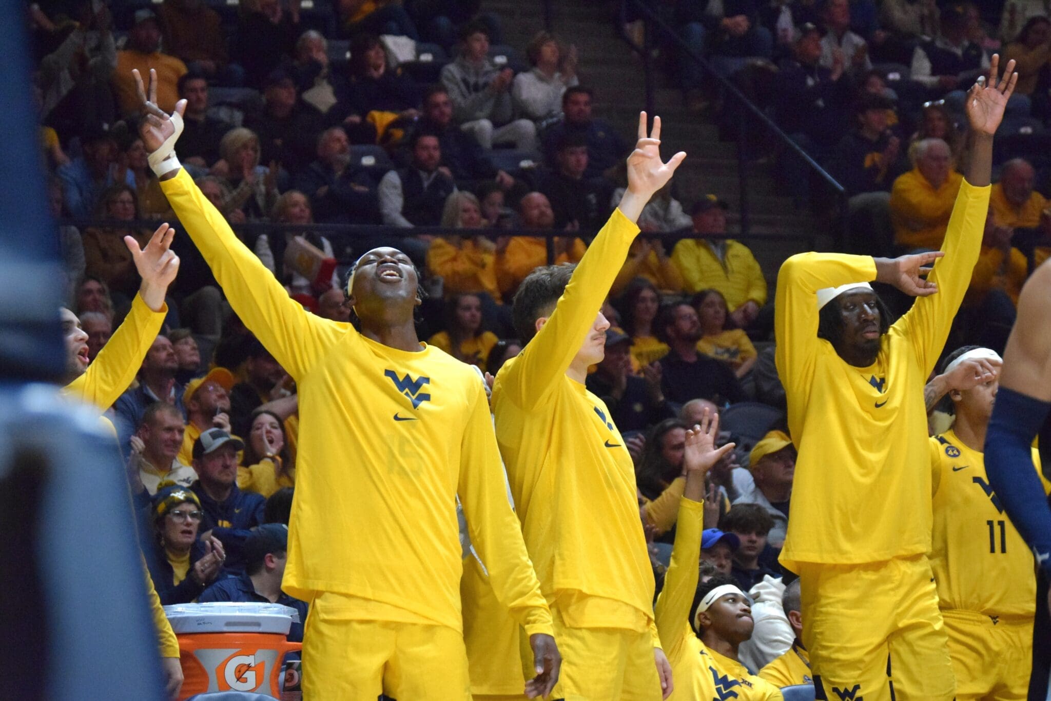 WVU Basketball team celebrating