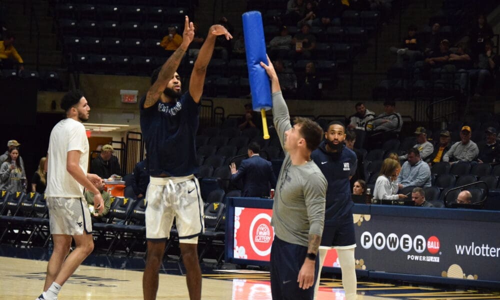 WVU Basketball Jeremiah Bembry and Coach Jordan McCabe