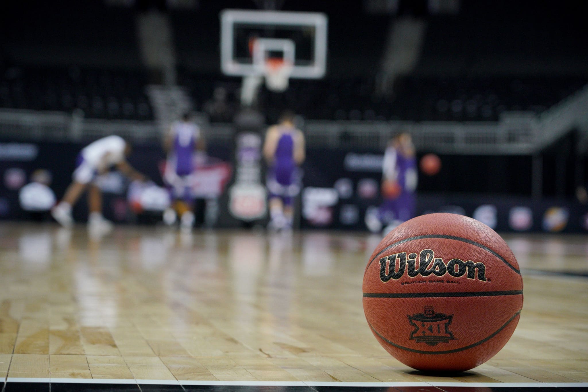 Big 12 logo basketball on court