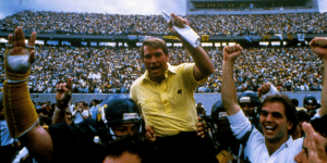 Don Nehlen carried off field