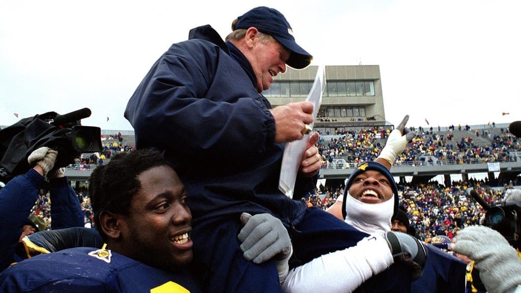 Don Nehlen carried off field