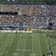 WVU flag on field at UCF