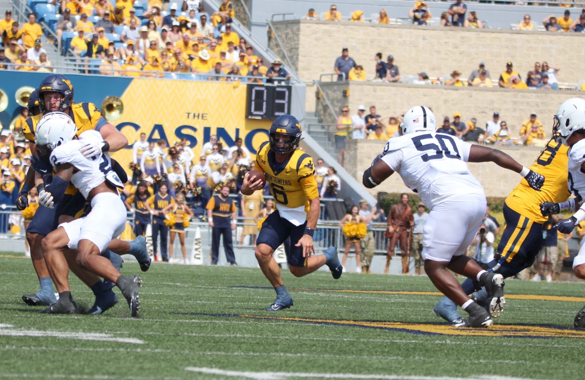 WVU Football QB Garrett Greene scrambling against Penn State