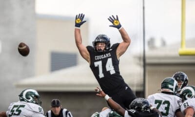Kevin Brown wearing WVU gloves