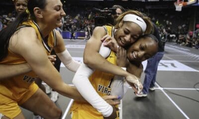WVU women’s basketball team celebrates after a win in the Big 12 Tournament