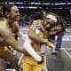 WVU women’s basketball team celebrates after a win in the Big 12 Tournament