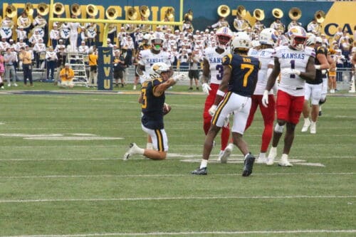 WVU Football WR Hudson Clement signals first down