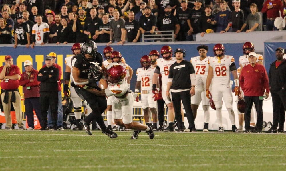WVU Football RB Jahiem White tackled by Iowa State