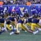 WVU Football team stretching stock photo with Rodney Gallagher