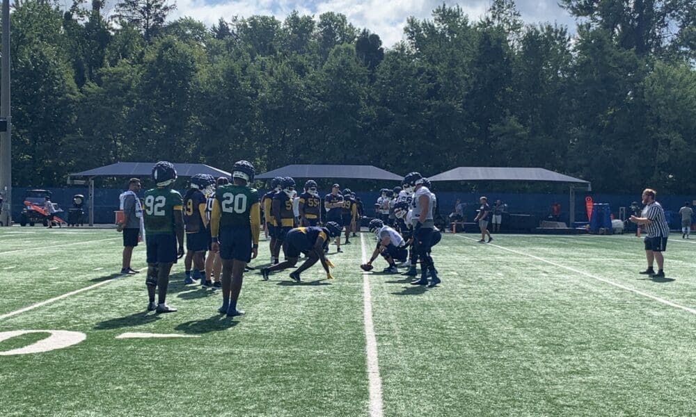 WVU Football OL and DL at practice