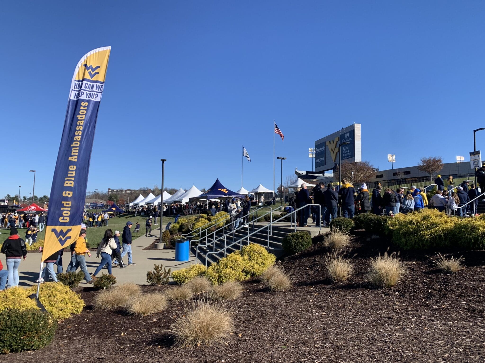 WVU Football fans outside Milan Puskar Stadium stock