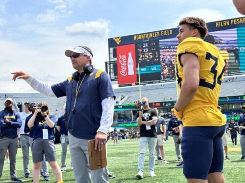 WVU Football HC Neal Brown presents spring award winner