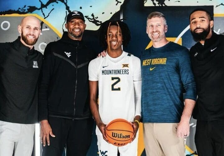 Josh Eilert and coaches recruiting Jasper Johnson