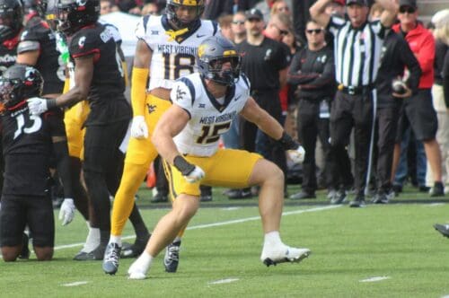 WVU Football LB Ben Cutter celebrates