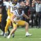 WVU Football LB Ben Cutter celebrates
