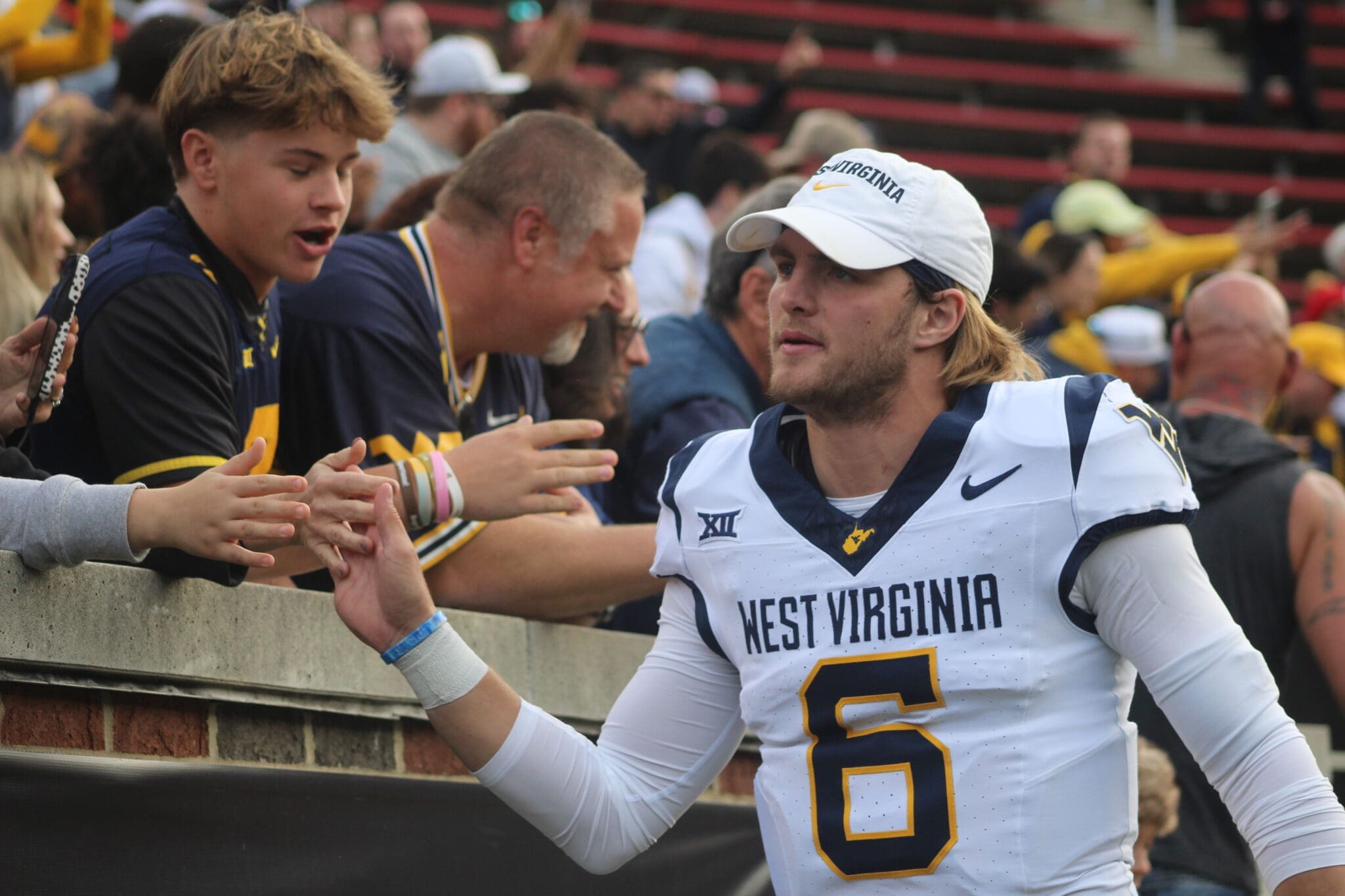 WVU Football QB Garrett Greene with fans