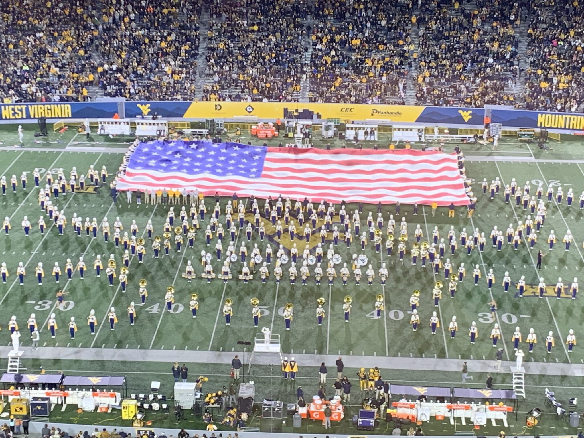 US Flag on WVU football field at Milan Puskar Stadium