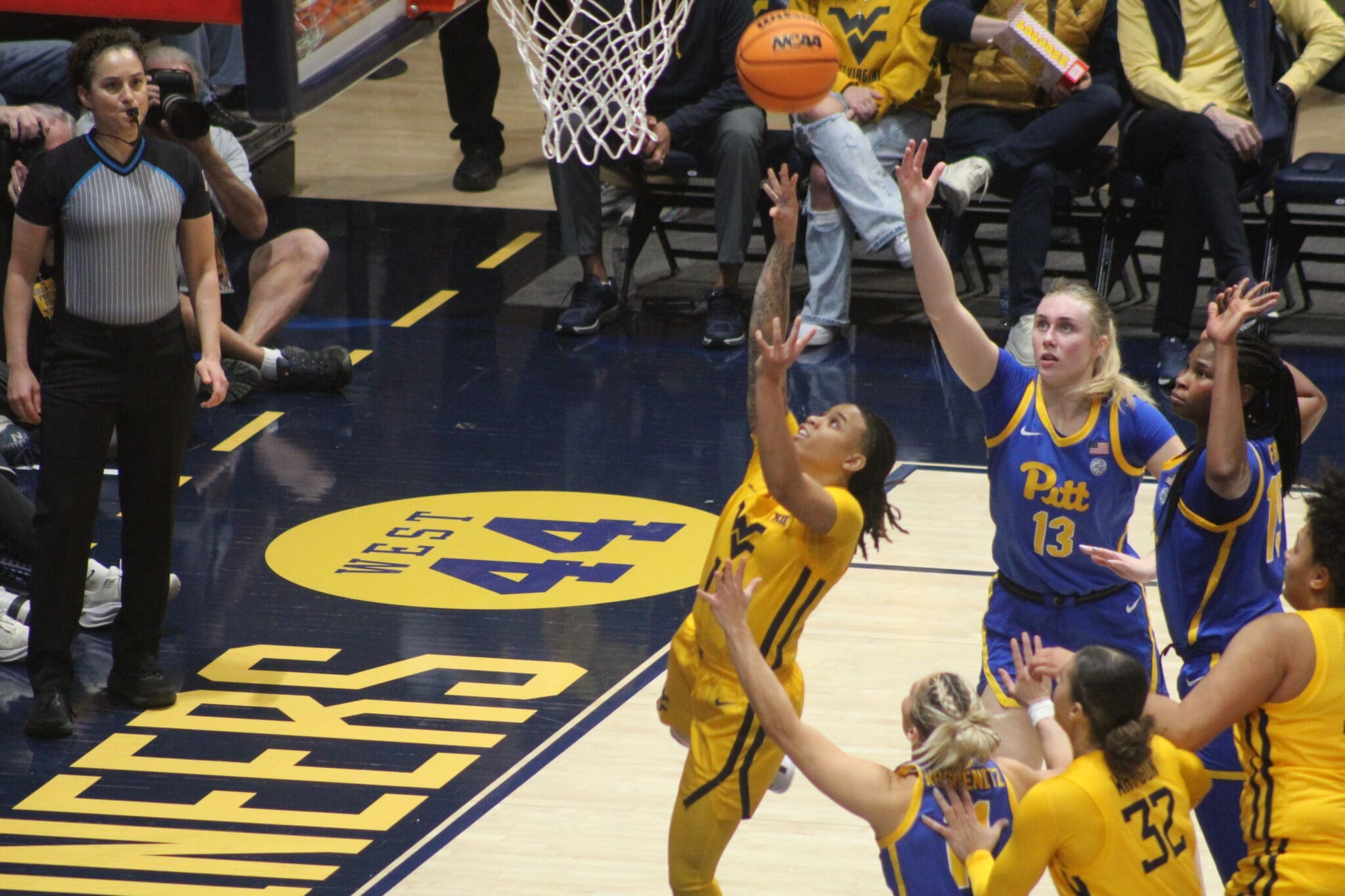 WVU Women's Basketball star JJ Quinerly Backyard Brawl