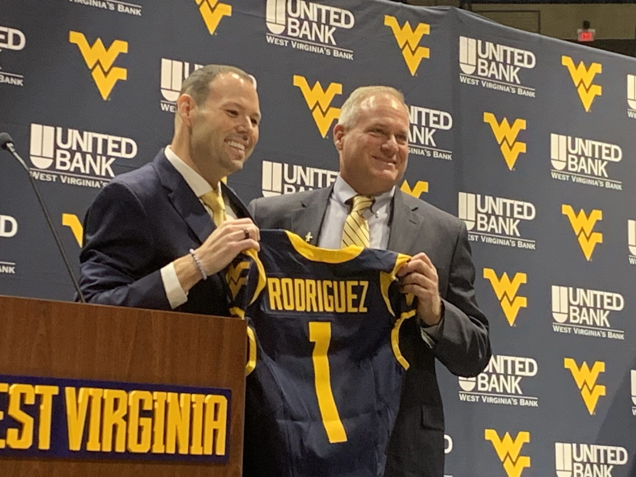 WVU Football HC Rich Rodriguez and AD Wren Baker