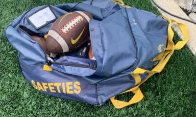 WVU Football in safeties bag stock