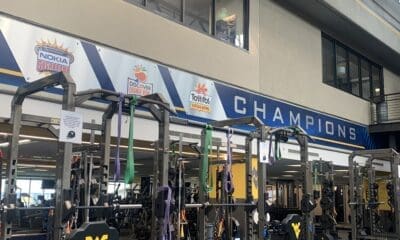 WVU Football major bowl wins on wall of weight room
