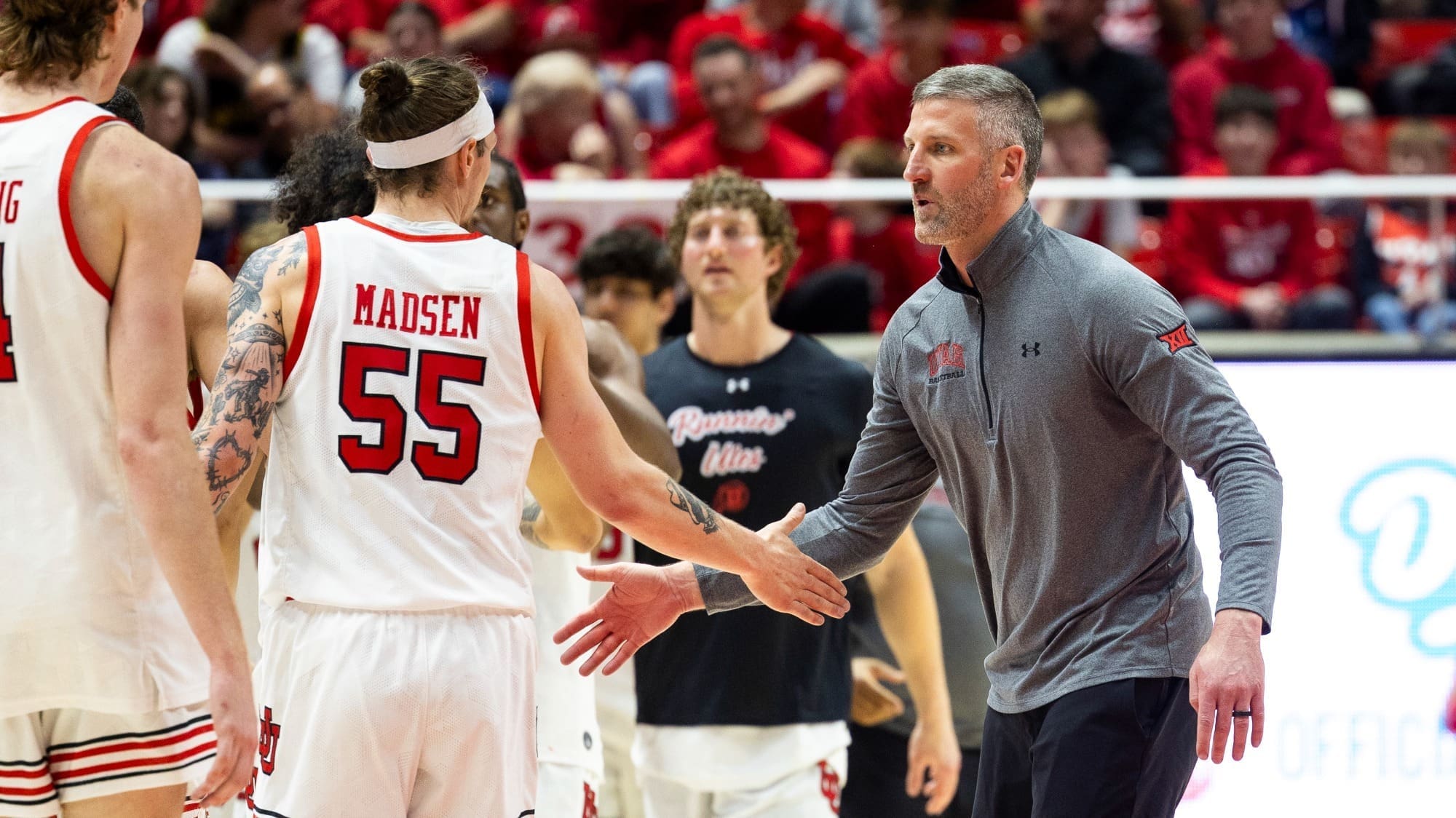 Josh Eilert as Utah coach