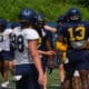 WVU holder Leighton Bechdel