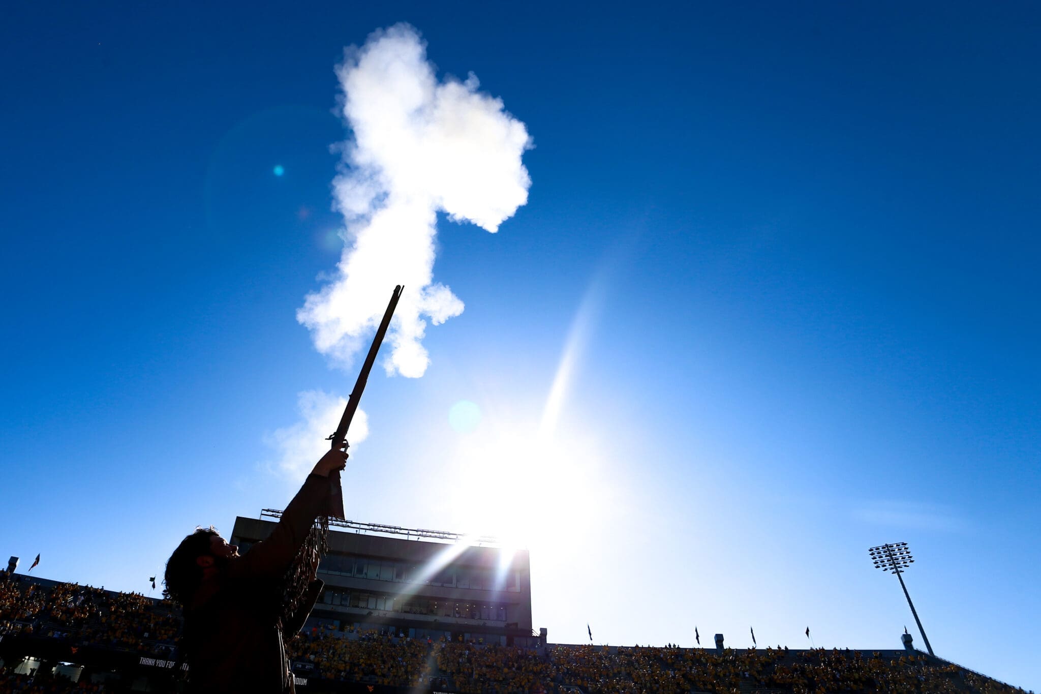 WVU Mountaineer Mascot fires off gun at game