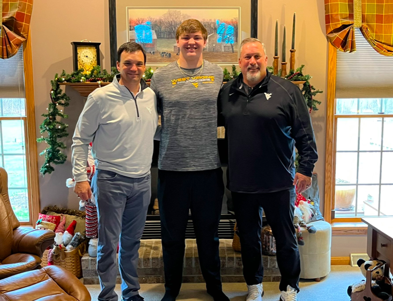 WVU coaches Neal Brown and Matt Moore