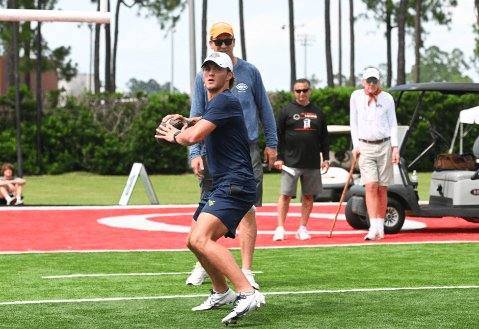 Garrett Greene and Peyton Manning at Manning Passing Academy