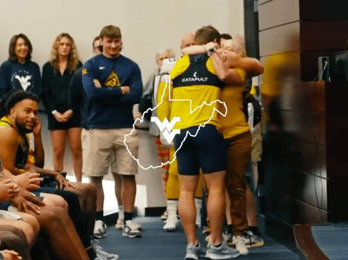 WVU Football celebrates as Caden Biser earns scholarship