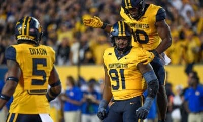 WVU Football DL Sean Martin with Jared Bartlett and Lance Dixon
