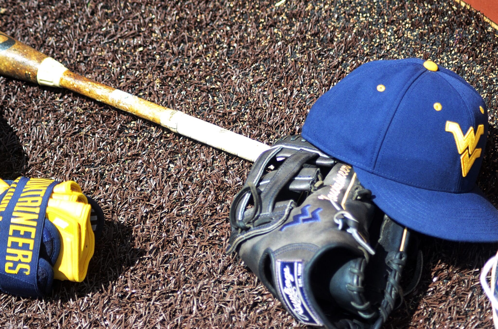 WVU baseball equipment lays on the warning track at North Carolina's Boshamer Stadium on Thursday, June 6, 2024. (Mitchell Northam, WV Sports Now)