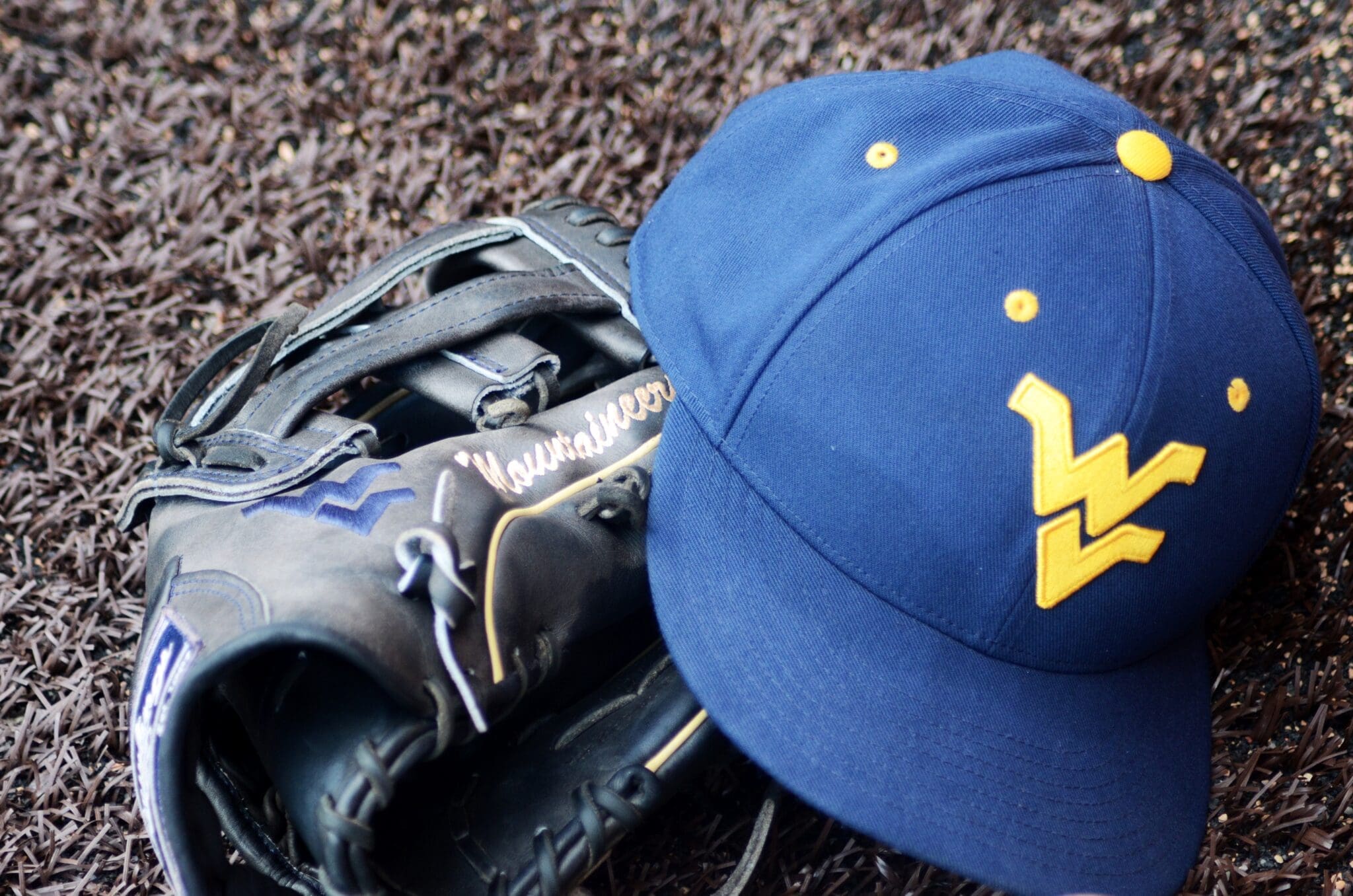 WVU baseball equipment lays on the warning track at North Carolina's Boshamer Stadium on Thursday, June 6, 2024. (Mitchell Northam, WV Sports Now)