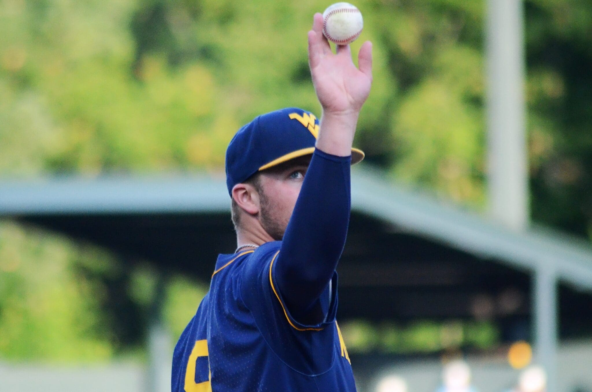 WVU Baseball Grant Hussey tosses a ball away as WVU played against North Carolina on June 8, 2024, in the Super Regionals of the NCAA Tournament at Boshamer Stadium in Chapel Hill, N.C. (Mitchell Northam / WV Sports Now)