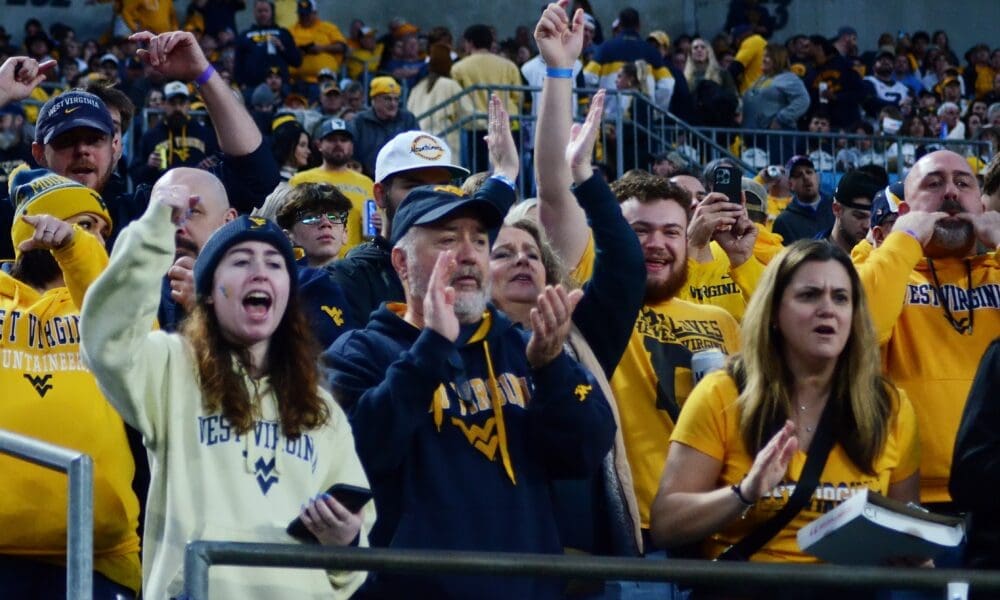WVU fans cheer at the Duke's Mayo Bowl on Dec. 27, 2023 at Bank of America Stadium in Charlotte, N.C. (Mitchell Northam / WV Sports Now)
