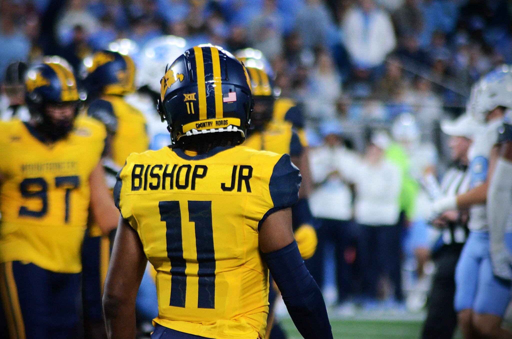 WVU returner Beanie Bishop Jr. after fair catching a punt against UNC in the Duke's Mayo Bowl at Bank of America Stadium in Charlotte, N.C. on Dec. 27, 2023. (Mitchell Northam / WV Sports Now)