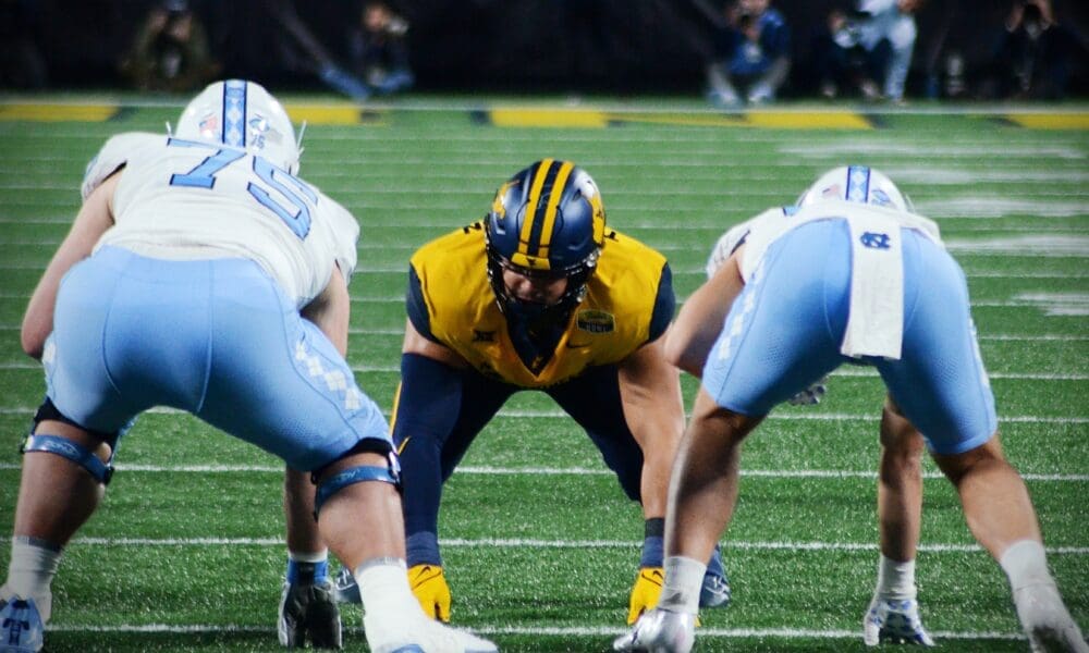 WVU Football defensive lineman Edward Vesterinen lines up against UNC in the Duke's Mayo Bowl at Bank of America Stadium in Charlotte, N.C. on Dec. 27, 2023. (Mitchell Northam / WV Sports Now)