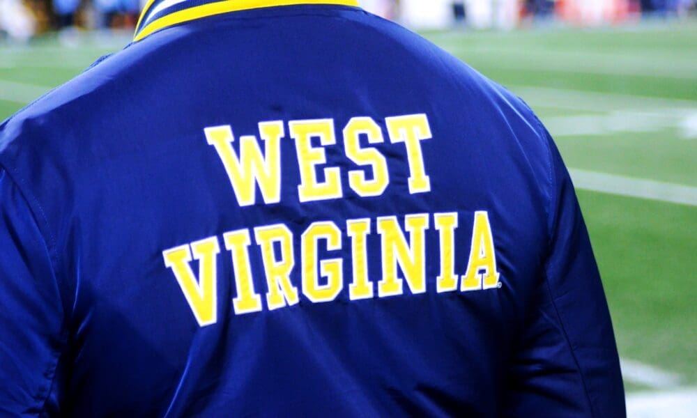 A WVU fan wears a Homefield jacket at the Duke's Mayo Bowl on Dec. 27, 2023 at Bank of America Stadium in Charlotte, N.C. (Mitchell Northam / WV Sports Now)