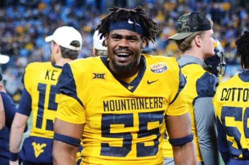 WVU Football DL Davoan Hawkins gets hype on the sidelines at the Duke's Mayo Bowl on Dec. 27, 2023, at Bank of America Stadium in Charlotte, N.C. (Mitchell Northam / WV Sports Now)