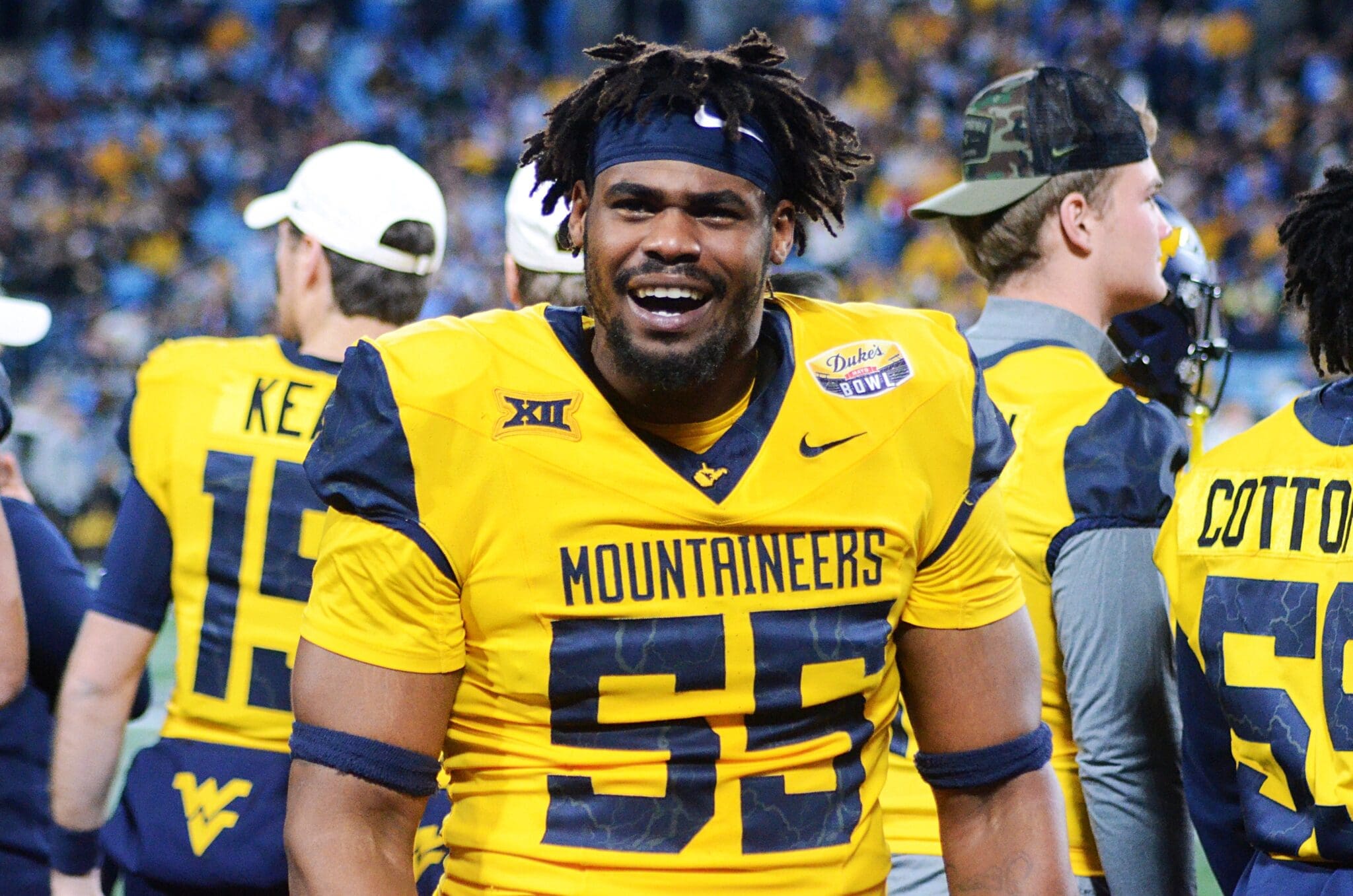 WVU Football DL Davoan Hawkins gets hype on the sidelines at the Duke's Mayo Bowl on Dec. 27, 2023, at Bank of America Stadium in Charlotte, N.C. (Mitchell Northam / WV Sports Now)