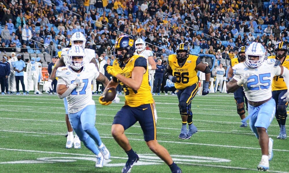 WVU Football tight end Kole Taylor breaks away for a big gain against UNC in the Duke's Mayo Bowl at Bank of America Stadium in Charlotte, N.C. on Dec. 27, 2023. (Mitchell Northam / WV Sports Now)