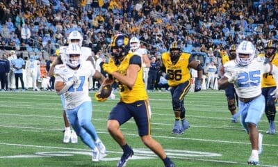 WVU Football tight end Kole Taylor breaks away for a big gain against UNC in the Duke's Mayo Bowl at Bank of America Stadium in Charlotte, N.C. on Dec. 27, 2023. (Mitchell Northam / WV Sports Now)
