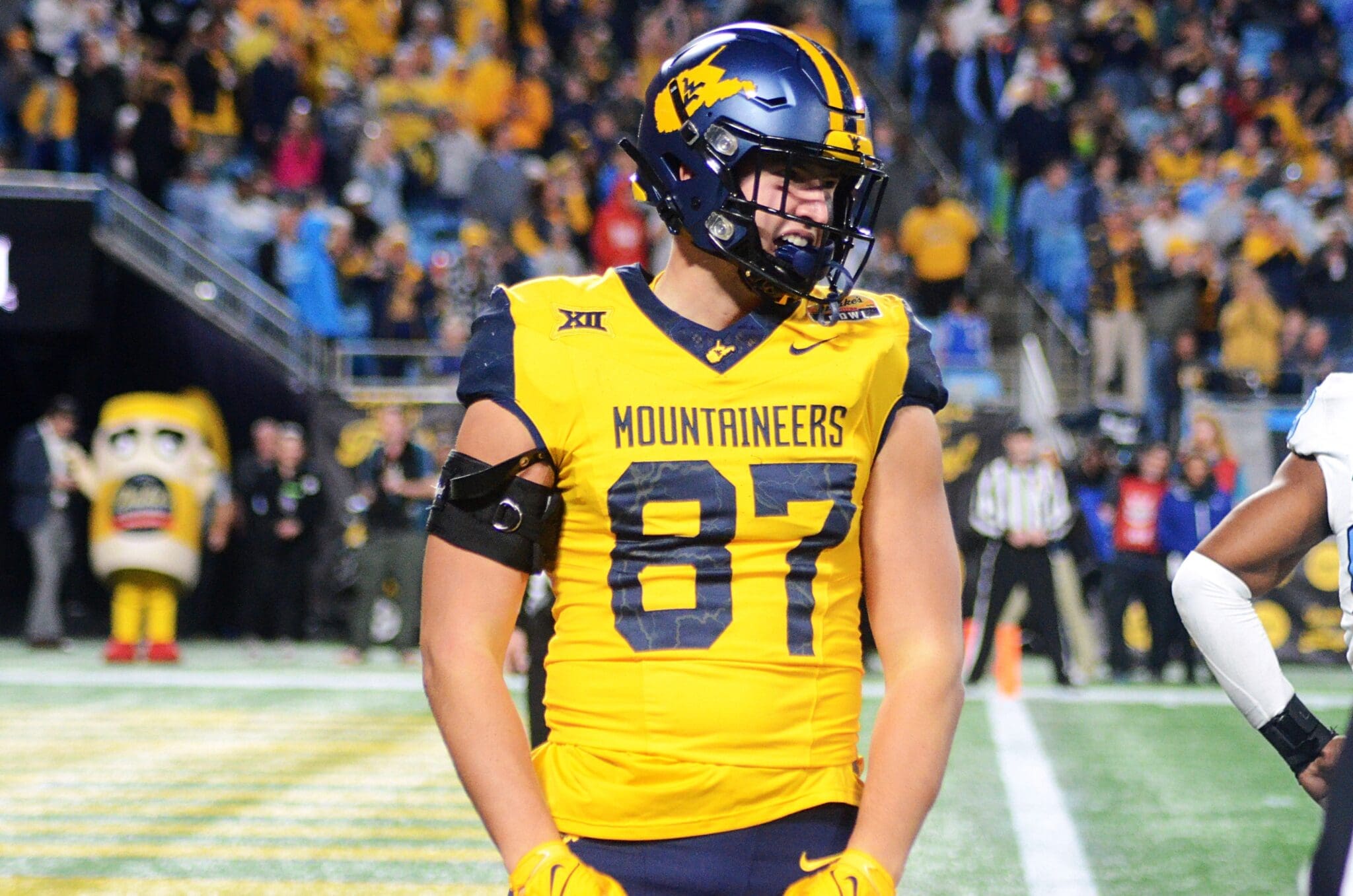 WVU Football tight end Kole Taylor flexes after a big gain against UNC in the Duke's Mayo Bowl at Bank of America Stadium in Charlotte, N.C. on Dec. 27, 2023. (Mitchell Northam / WV Sports Now)