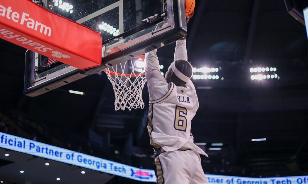 WVU Basketball center Mouhamed Sylla dunking