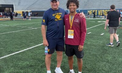 WVU Football HC Rich Rodriguez with CB recruit Masaii Acrey